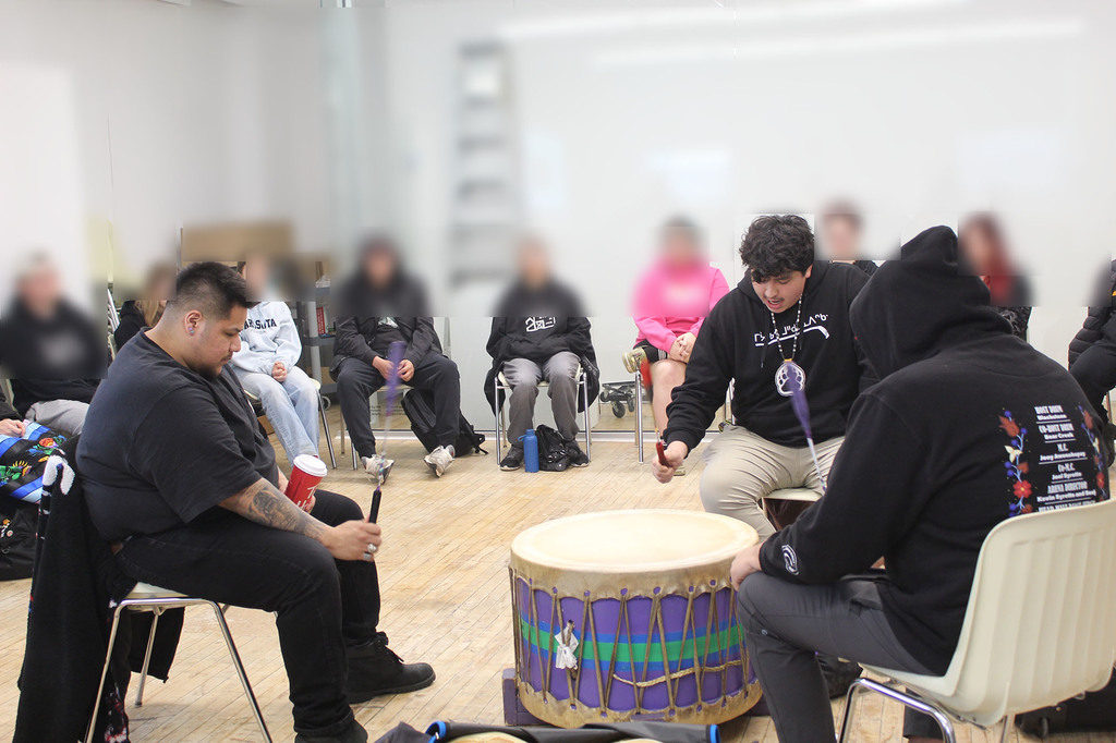 Walking bear singers drumming