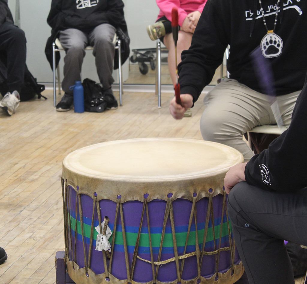 Walking bear singers drumming