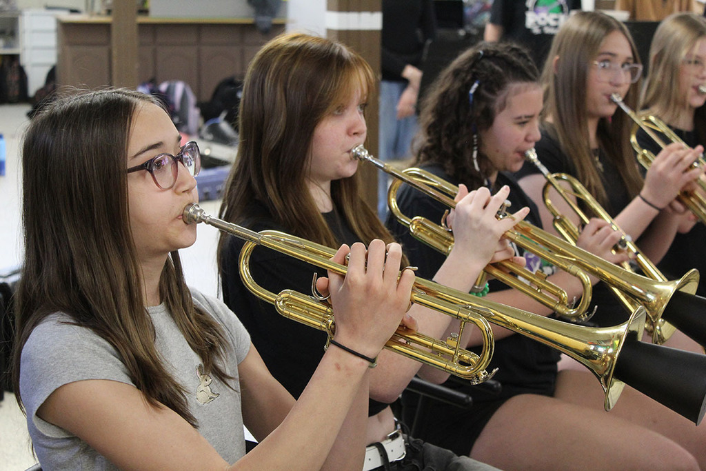 Students playing instruments