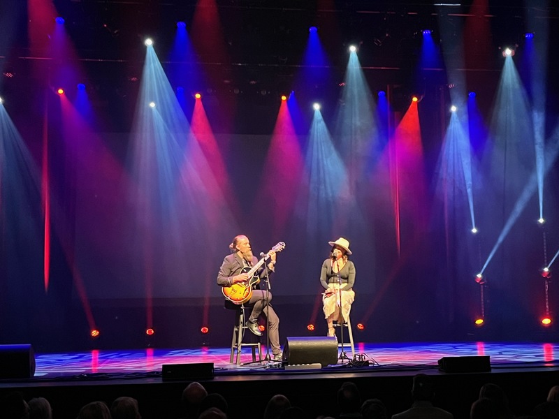 Two musicians on stage at the River Run Centre