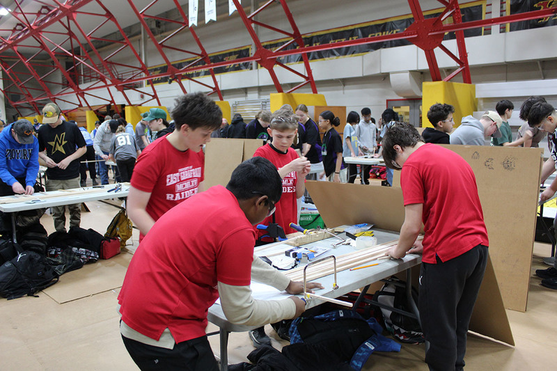 Students doing wood working at skills