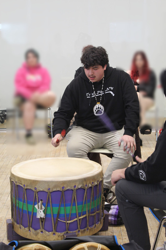 Walking bear singers drumming