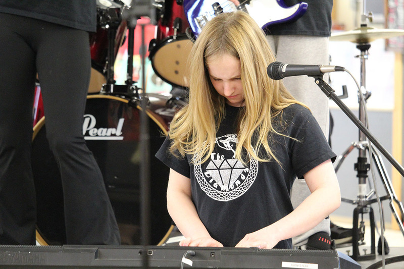 Students playing instruments