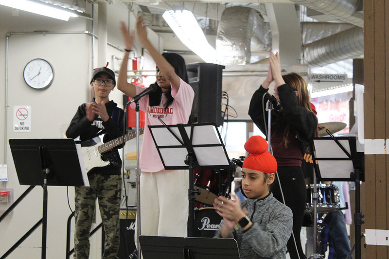 Students playing instruments