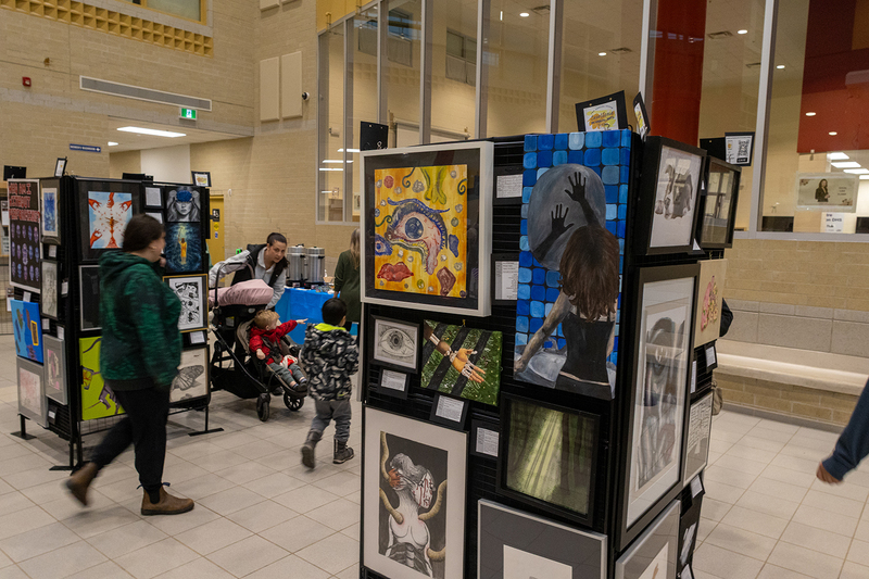 Student art on display in a school gym.